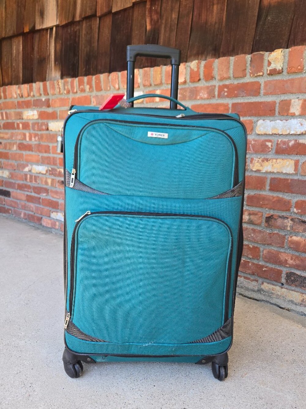 U.S. Traveler Aviron Bay Checked Suitcase – Teal Blue 4-Wheel Expandable Softsid